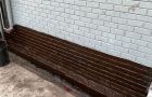 Foundation Sealer For Proper Waterproofing On White Brick Wall